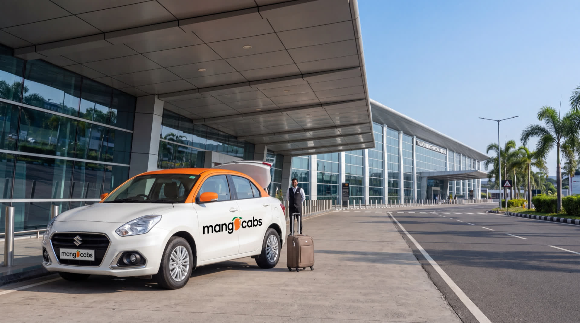 A white Mango Cabs Maruti Dzire waiting at the departures kerb of Trivandrum International Airport, chauffeur loading a suitcase